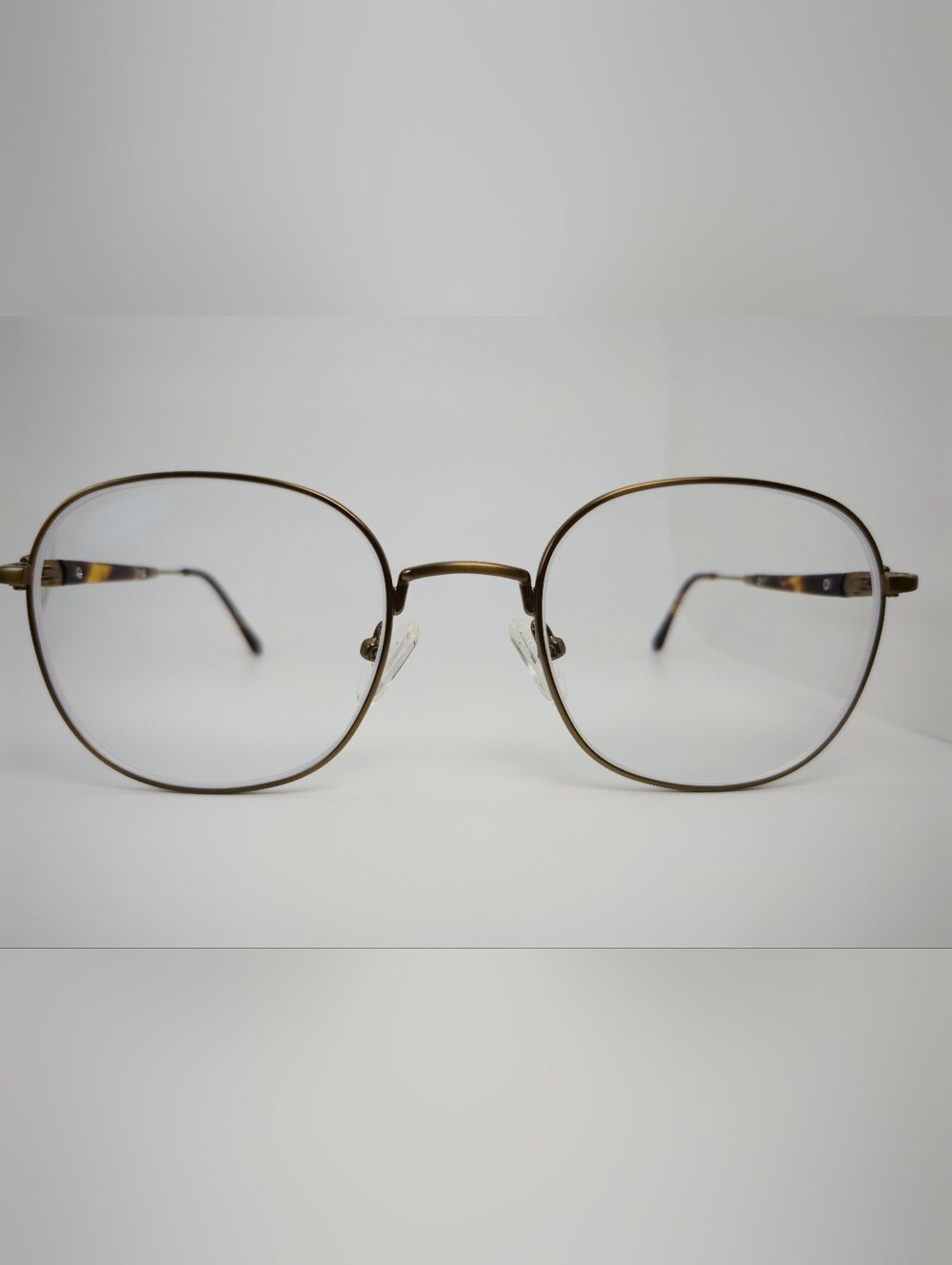 Index. Classic Thin Metal Round Eyeglasses in Antique Bronze.